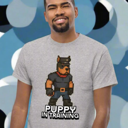Smiling guy in a pup in training tshirt with pixelated dog graphic, perfect for pup play